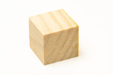 single wooden cube block isolated in white background.