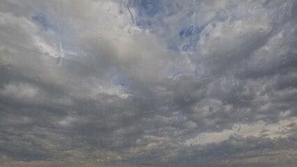 cloudburst on sky with clouds - cute weather bg - photo of nature