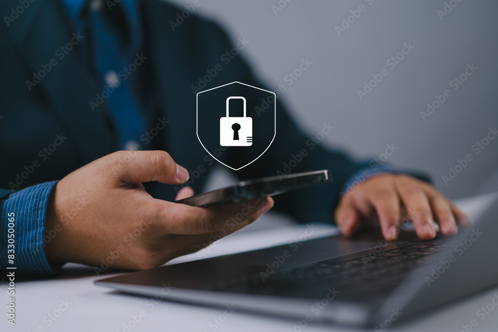Fototapete Cybersecurity and privacy concepts to protect data. Businessman use smartphone with cyber security technology for protecting personal data and secure internet access.