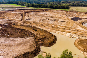 Development of a sand quarry for the extraction of construction sand, panoramic aerial view....