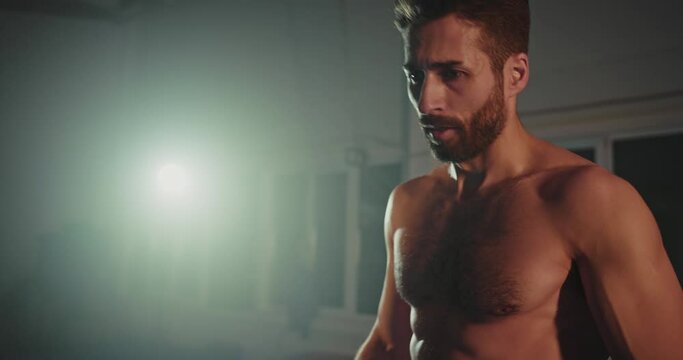 Shirtless Man Standing in Room