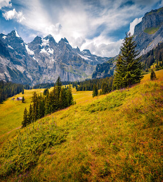 Majestic summer view of huge mountains in outskirts of Oeschinen Lake. Great morning scene of Swiss Alps, Kandersteg village location, canton of Bern, Switzerland, Europe. Travel the world..