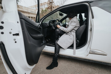 A professional businesswoman dressed in a smart coat steps into a stylish car, symbolizing success and corporate lifestyle.