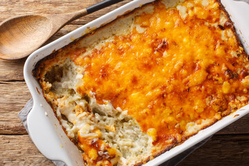 Сlassic Southern hashbrown casserole is made with sour cream, Cheddar cheese and condensed soup...