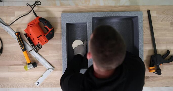 Installation of double sink on a wooden countertop craftsman