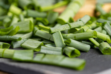 green onions on the table during cooking