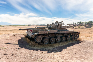 Obraz premium A Israeli tank destroyed during Yom Kippur War is located in the Valley of Tears near OZ 77 Tank Brigade Memorial on the Golan Heights in northern Israel