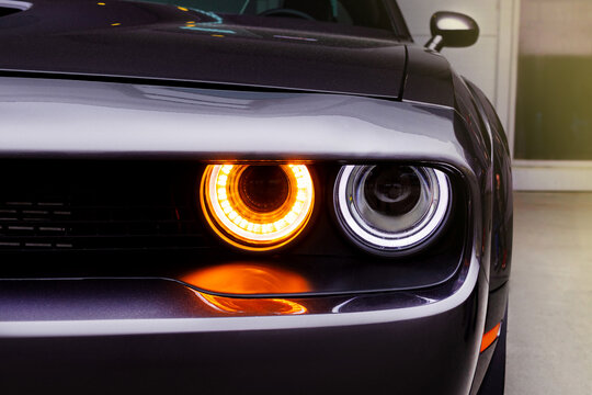 Russia, Novosibirsk, 25.05.2024 Midday, headlight of black Dodge Challenger