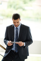 Business, office and man with tablet for news app, drafting email and internet connection for legal...