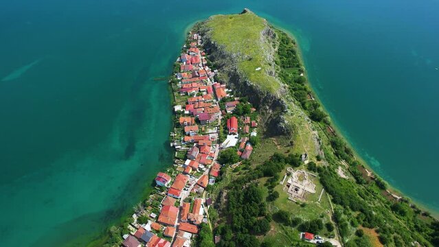 Albanian Gem on the Lakeside: Aerial Drone View of the Beautiful Rocky Peninsula and Village of Lin, Pogradec