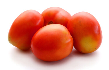 Fresh red ripe tomatoes against white background - stock photo
