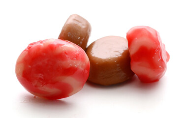 milk caramel candies isolated on white
