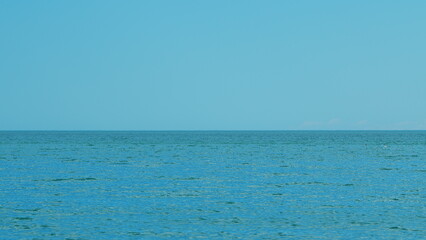 Clear Blue Waves. Waves Of The Sea On A Clear Day With Blue Sky. View Open Sea Background.