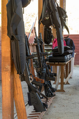 Fototapeta premium Vending machines standing in a row. Machine guns at the shooting range. Weapons at the training ground. Firearms training.