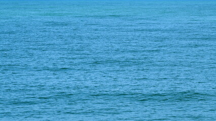 Blue Glittering Sea Surface. Crystal Clear Sea Water. Still.