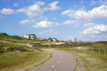 View on the city of Zandvoort in the Netherlands, as seen from a bicycle path in the dunes near the North Sea coast