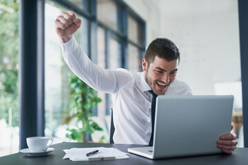 Businessman, happy and celebrate with laptop for success in office for stock market or winner in...