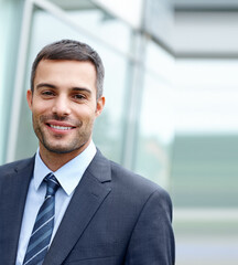 Businessman, happy and portrait in office with smile for career, work and company or corporate job....