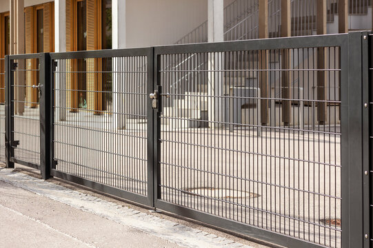 Gate to Privacy. Entrance Gate to Private Building School. Modern Wire Gates. No Entry.