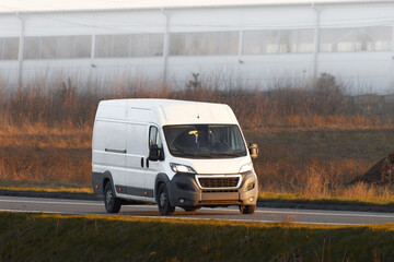 Internet Orders on the Move in a White Delivery Van