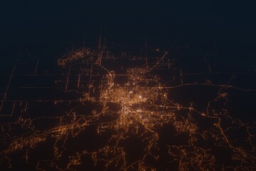 Aerial shot on Rapid City (South Dakota, USA) at night, view from west. Imitation of satellite view on modern city with street lights and glow effect. 3d render