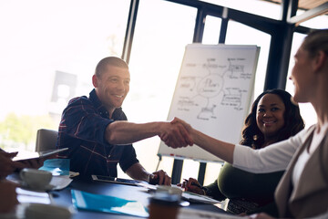 Business people, meeting and handshake for teamwork, onboarding and b2b collaboration with creative...