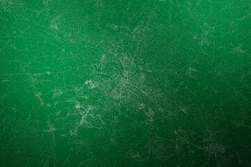 Map of the streets of Dresden (Germany) made with white lines on abstract green background lit by two lights. Top view. 3d render, illustration