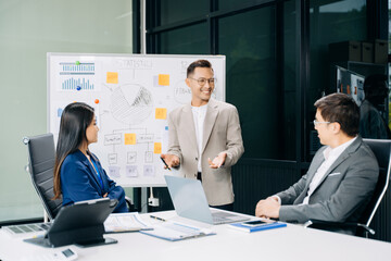 Business team discuss at meeting room. working together with laptop ,tablet and smart phone on desk Financial accountant