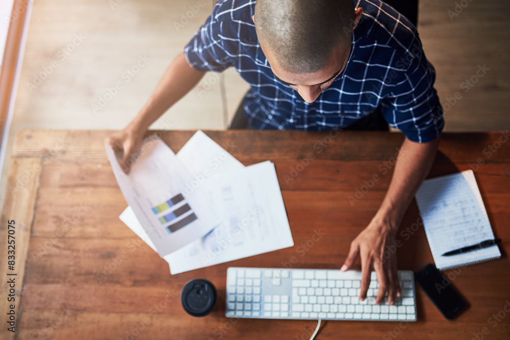 Poster Above, man and keyboard for communication, networking or connection in modern office as web designer. High angle, male person, workplace and tech with document as professional in company or business
