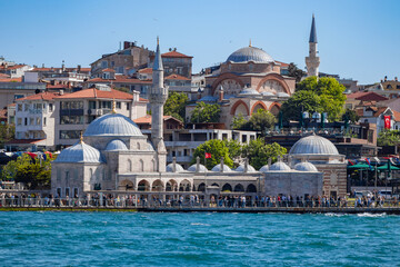 The Rumi Mehmet Pasha Mosque stands high behind the Şemsi Ahmet Pasha Mosque (Kuşkonmaz Mosque)...
