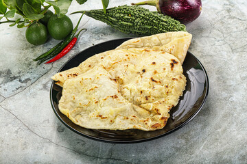 Indian tandori bread - naan with cheese