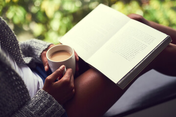 Coffee, relax and woman with book by window for peace, learning poetry and reading novel on...