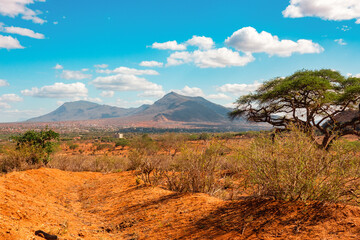 Scenic view of mountain landscapes against sky at Tsavo East National Park in Kenya 