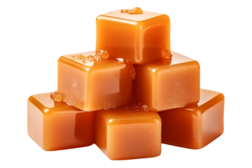 Heap of salted caramel cubes isolated on transparent background.