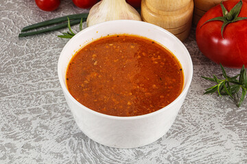 Hot tomato soup with diced chicken
