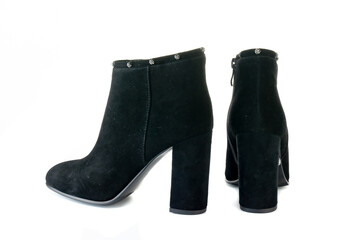 Women's red shoes from a varnish on a white background