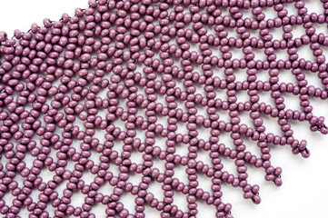 Women's necklaces made of multi-colored beads with Ukrainian national patterns.