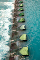 The flow of water through the spillway