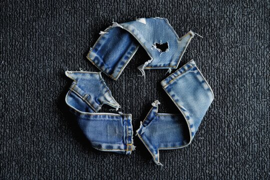Upcycled denim creates new life for recycling logo created from old jeans