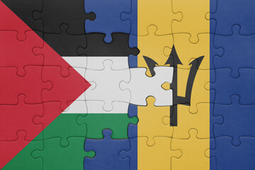 puzzle with the colourful national flag of barbados and flag of palestine.