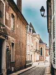 Street view of old village Cambrai in France