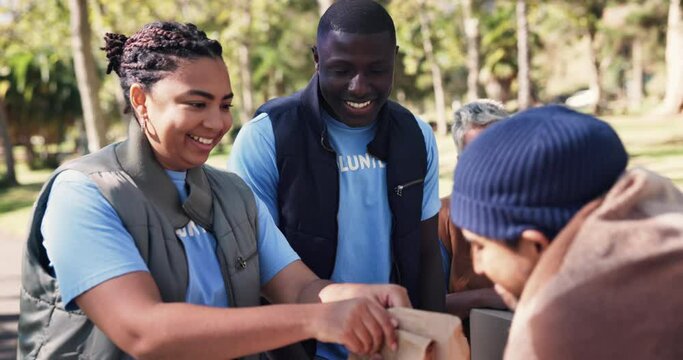 Volunteer, donation and community with box for charity, distribution and food to poverty society, refugee and immigrants. Smile, team and package with grocery, product and care for homeless people