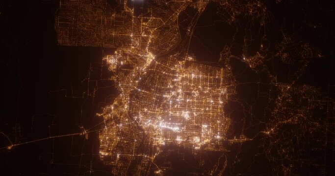Albuquerque (New Mexico, USA) aerial view at night. Top view on modern city with street lights. Camera is zooming out, rotating clockwise