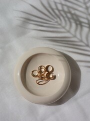 A box with golden jewelry 