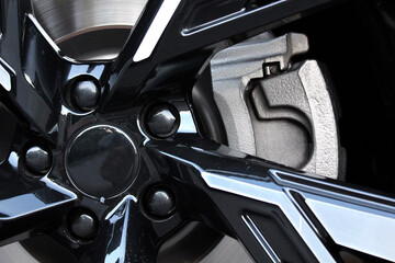 Sport car braking system. Suv car wheel brake. Close up car wheel. Magnesium alloy wheel. Alloy car...