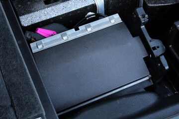 Close up car sound amplifier. Auto audio amplifier for car. Car amplifier. Premium audio system.