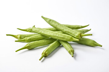 Fototapeta premium Fresh Green Okra Pods Isolated on White Background