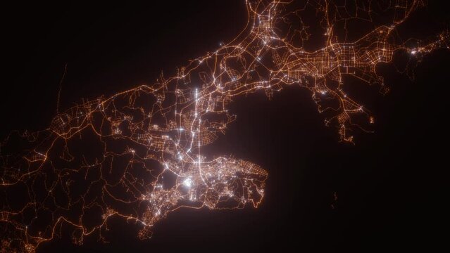 Dalian (China) aerial view at night. Top view on modern city with street lights. Camera is flying above the city, moving backward
