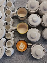 Latte art on coffee, coffee on the table in a cafe