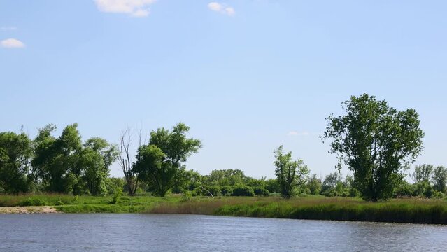 sliding along the landscape of the banks of the Elbe river near Magdeburg, Germany